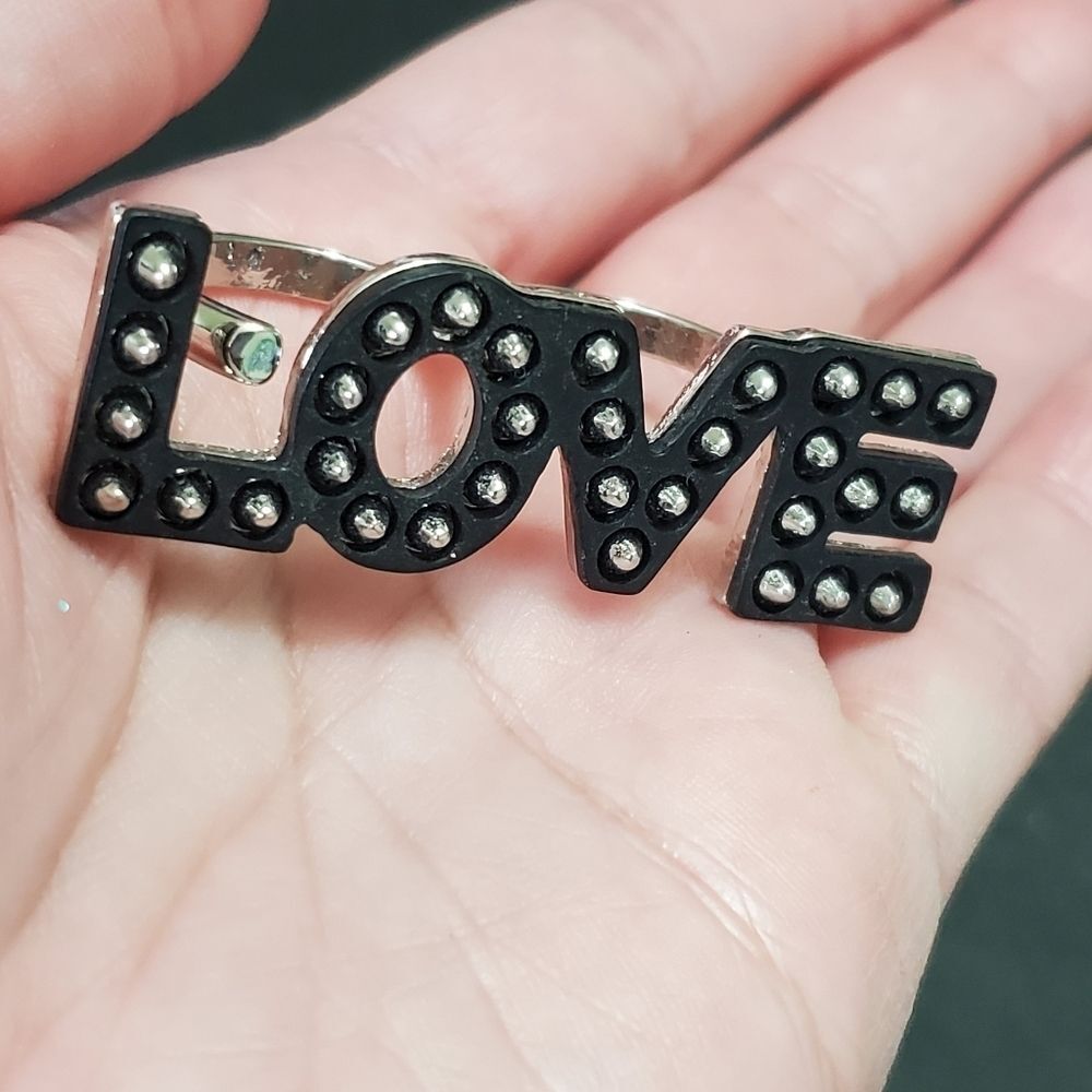 Silver tone and black double finger love ring